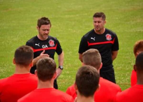 Graham Alexander and Chris Lucketti take training