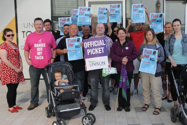 Strong feelings: Blackpool Council workers picket line outside the new Talbot Gateway buildings