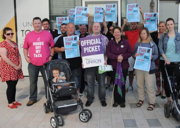 Strong feelings: Blackpool Council workers picket line outside the new Talbot Gateway buildings