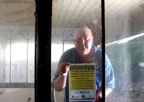 Police Volunteer Community worker Andrew Noble slams mindless hooligans after hundreds of pounds worth of damage was done to Grade II listed Promenade Shelters at Lytham St Annes.
Pictured is Lancashire Constabulary Volunteer Andrew Noble with the damaged shelters along the Promenade.
25th July 2014