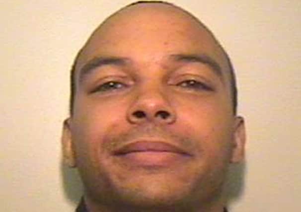 Wayne Whitley, 40, who was serving a life sentence for a series of violent armed robberies, has absconded from HMP Kirkham
