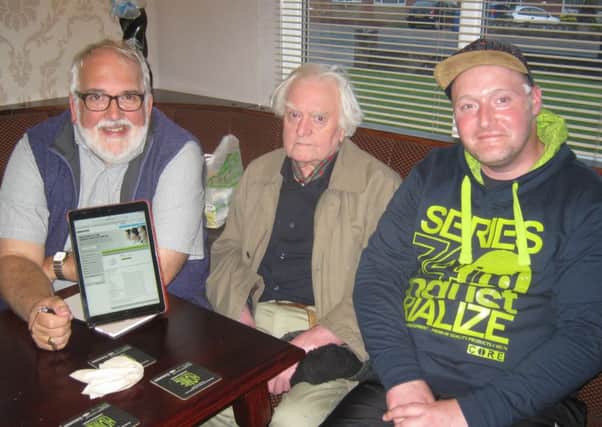Overseeing Emmanuel Church West's computer clinic is Dave Carlos (left) with  Gordon Hisco (centre) and Peter Vernal.