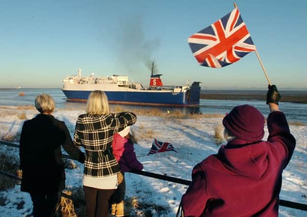 The last Stena Line ferry left Fleetwood this morning, leaving a question mark over the port's future.
Pharos Ward Councillor Bernice Harrison waves a Union Jack in farewell. PIC BY ROB LOCK
24-12-2010