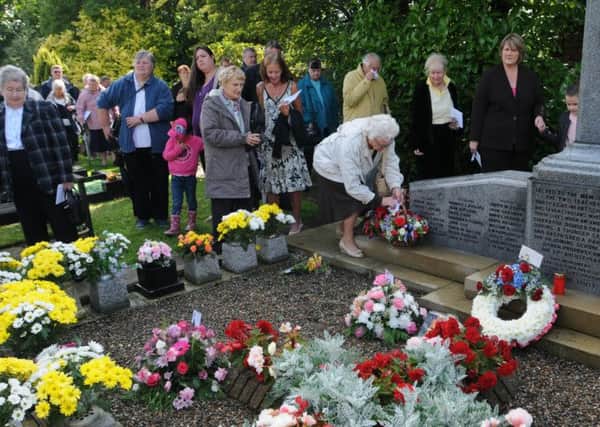 Photo: David Hurst
Service held in Holy Trinity CC Church grounds to commemoratethe 70th anniversary of the Freckleton Air Disaster
Crowds show their respects after the service
