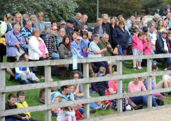 Penny Farm horse rescue centre near Blackpool held a medieval open day.
Crowds gather to watch the action in the paddock.