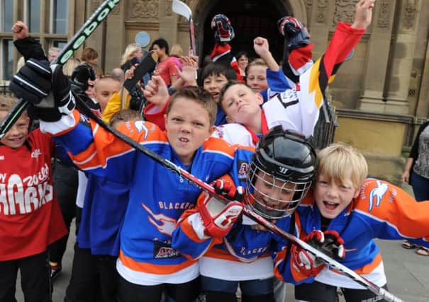 N-ice one: Young supporters celebrate the councils decision to grant permission to the  Fylde Close Ice Arena outside the Town Hall