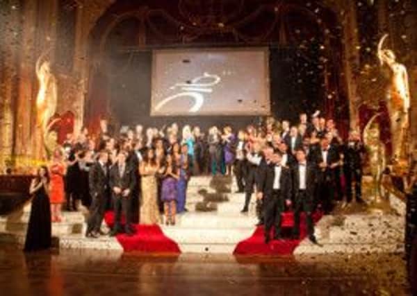 Winning feeling: The 2013 BIBAs winners on stage at the Tower Ballroom