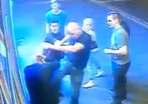 CCTV stills of a teenager being attacked by a stranger after a night out in Blackpool, on Dickson Stree