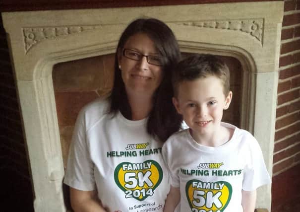 Mum Kirsty Atkinson is running a 5k course with her son Joseph who had open heart surgery when he was just five-months-old after being born with a congenital heart defect