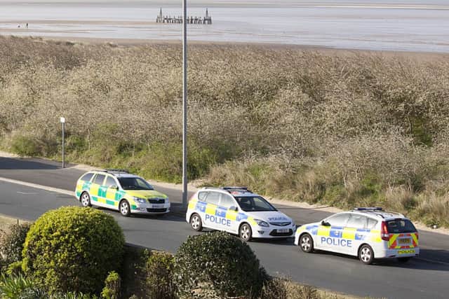 Police and ambulance by the beach in St Annes where the body of a man has been found.