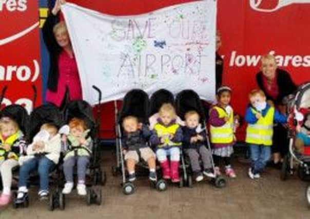 Children and staff from Lilliput Kiddie Care hold a 'Save Our Airport' rally at Blackpool Airport