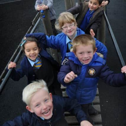 Pic to illustrate story on Blackpool's third driest September in over 100 years- Year 1 pupils at St Nicholas CE Primary School in Marton have fun on the Trim Trail, with Sean, William, Mya, Cruz, Maria, Kai and Gemma.  PIC BY ROB LOCK
8-10-2014