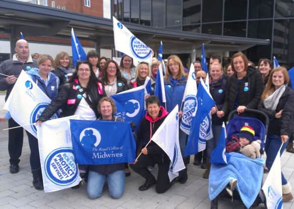 Health workers - members of the Royal College of Midwives, Unison and Unite - taking part in national strike action outside Blackpool Victoria Hospital