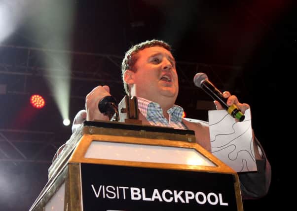 Switch-on: Peter Kay turns on the Lights.