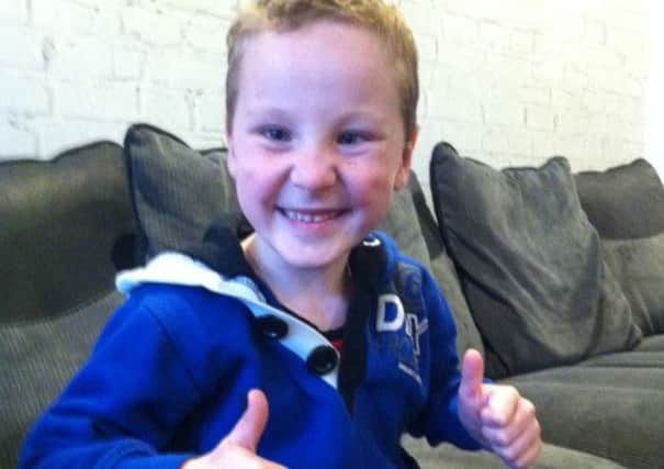 Kai Hodgkinson who is recovering at home from surgery to help him walk unaided