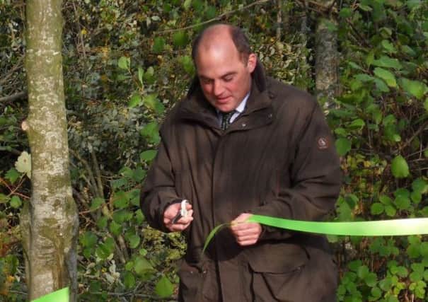 MP Ben Wallace cuts the ribbon on the path opening