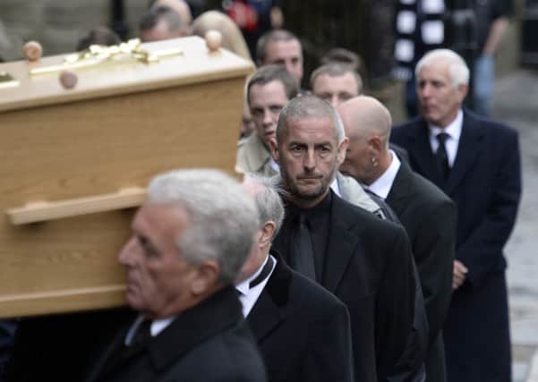 Support: Barry Sweeney, 
pictured at his son Liams funeral, will  stand shoulder to shoulder with the family of  Glenn Thomas