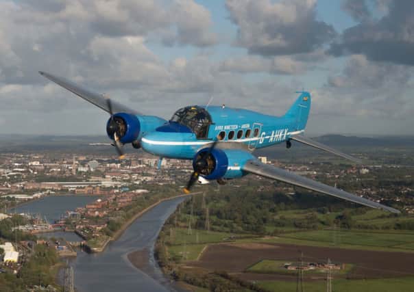 The Avro Anson, owned by BAE Systems which forms part of The Shuttleworth Collection, in flight over Preston docklands on its way to the Heritage Week event held at the company&#39;s aerodrome in Warton, Lancashire. Picture by Chris Ryding/BAE Systems.