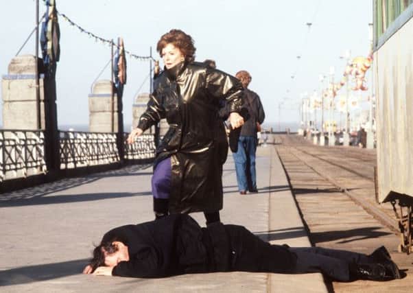Famous scene:  Coronation Streets Alan Bradley lies dead beside the tram tracks opposite the Strand Hotel on Blackpool Prom as a distraught Rita Fairclough looks on
