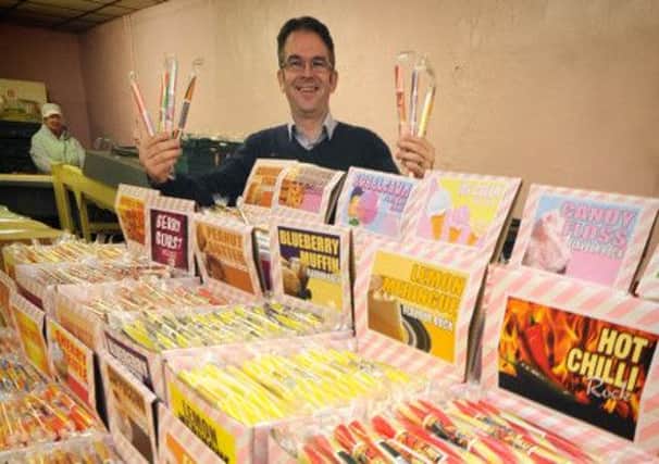 Sweet treats: Director Elliot Jones with the Stanton and Novelty Confectioners companys range of flavours