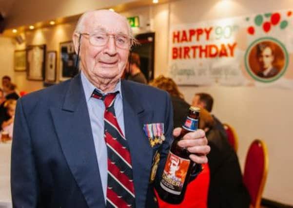 Blackpool war veteran Ron Marlow celebrates his 90th birthday with a personalised bottle of beer featuring a picture of him in uniform.