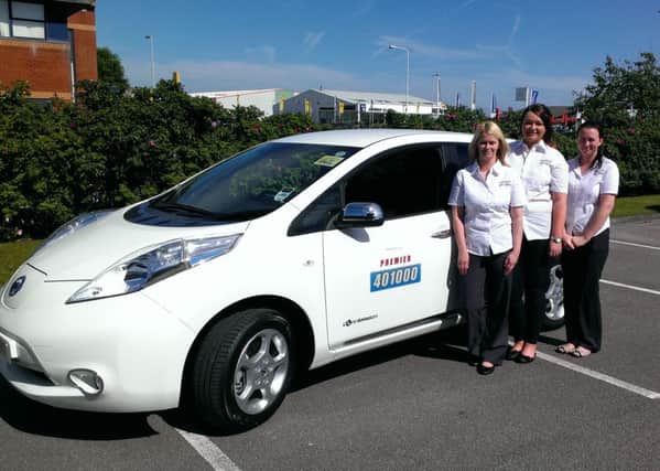 Electric car: Sabrina Webster, Lauren Thompson and Nakita Cutler of Premier with their first electric taxi
