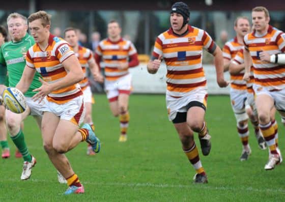 Sam Bedlow makes a break for Fylde