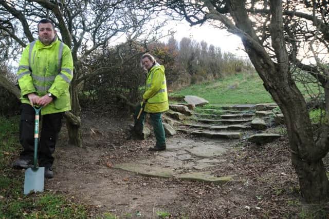 Fylde Borough Council are hoping to win a grant to uncover and renovate the 'lost gardens' next to Fairhaven Lake in Ansdell.
Workers Stuart Bimpson (left) and John Musson in an area of the gardens.  PIC BY ROB LOCK
17-11-2014
