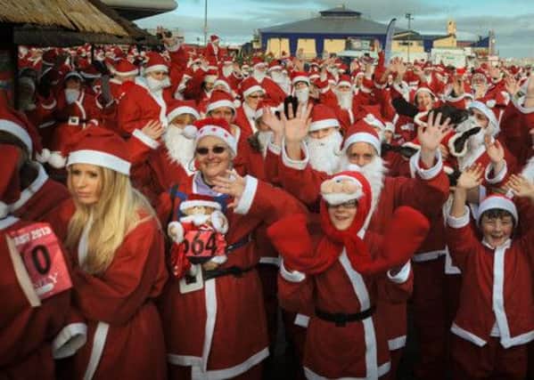 Run, run rudolph: More than 1,000 Santas lined up for last years Trinity Hospice Santa Dash