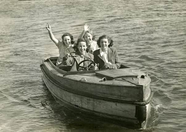 Women enjoying a ride on a motorboat on Fairhaven Lake in the 1950s