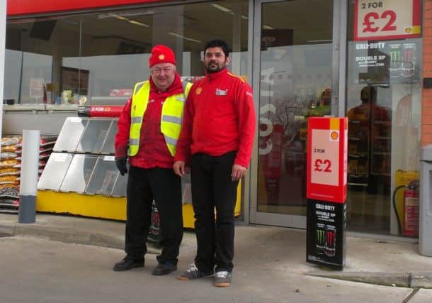Frank Lofthouse and Zuber Patel at the Shell Garage on the A585 Mains Lane poulton