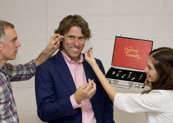 Eye eye: Comedian John Bishop is matched for eye colour by the sculptors at Madamme Tussauds