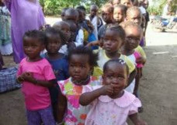 Terrible state: Abandoned orphan children in Sierra Leone. Their parents have  died from Ebola