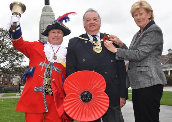 Impressive total: Town crier Colin Ballard, St Annes town mayor Coun Ed Nash and his wife, Fylde councillor Barbara Nash at the launch the 2014 poppy appeal for Lytham and St Annes