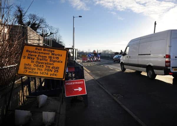 Single lane: Work on Station Road Bridge is expected to last for three months. Coun Elaine Silverwood, below, says the work will cause  rush hour disruption for drivers in Kirkham