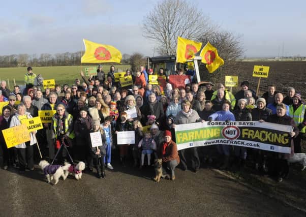 Residents and neighbours of Roseacre village gather to protest against fracking in the area