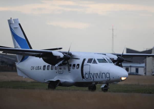 A Citywing aircraft which flew from Blackpool Airport. Below, Simon Menzies of Pool Aviation