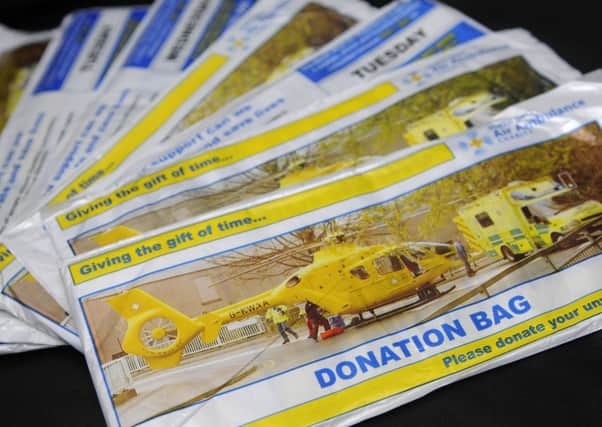 The North West Air Ambulance charity donation bags, which are believed to be counterfeit
