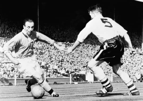 Stanley Matthews in action during the 1953 FA Cup final at Wembley