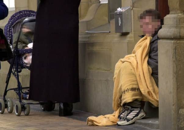 A second beggar has been issued with a Criminal Anti-Social Behaviour Order by Blackpool Council, below, Nicholas Stewart and Coun Gillian Campbell