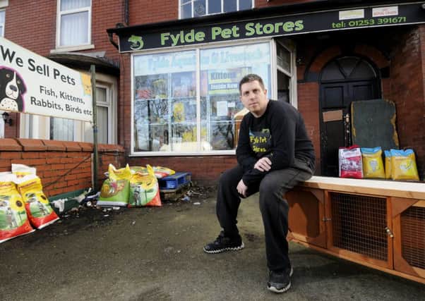 Andy Pasquill outside his Layton pet store