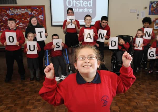 Children from Red Marsh School celebrate their outstanding Ofsted report