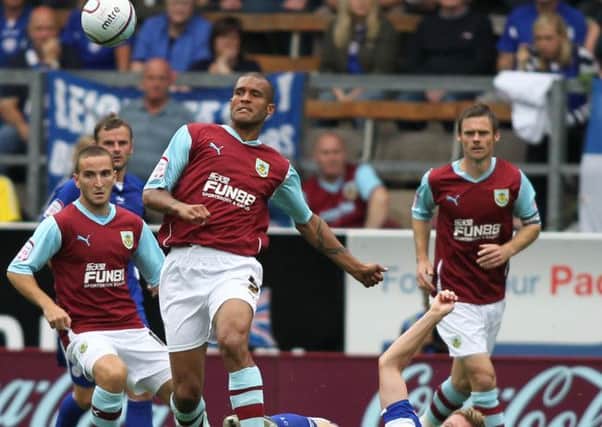 Graham Alexander and Clarke Carlisle in action for Burnley