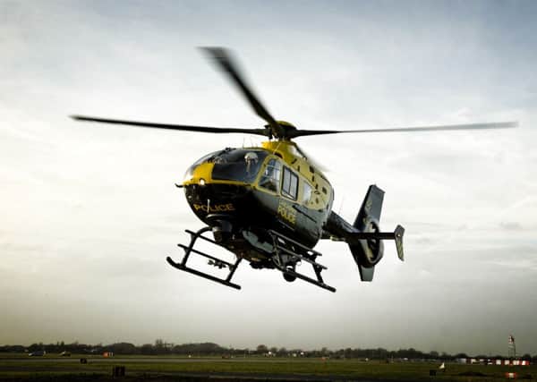 The police helicopter was deployed to help search for the driver of a car that crashed into a house in Preesall.