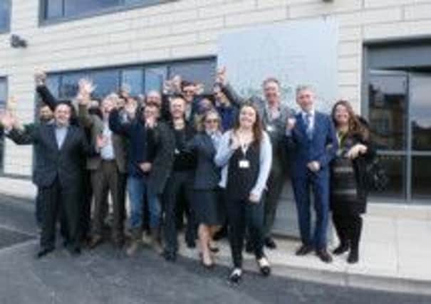 Danbro staff celebrate as Colon hand over the new Danbro building in Lytham