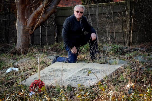 Local historian Mike Coyle by a derelict war memorial in the grounds of the former Co-Operative Sports and Social Club on Preston New Road in Marton, Blackpool