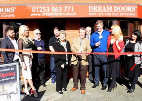 Wyre mayor Coun Ron Shewan opens the new branch of Dream Doors
