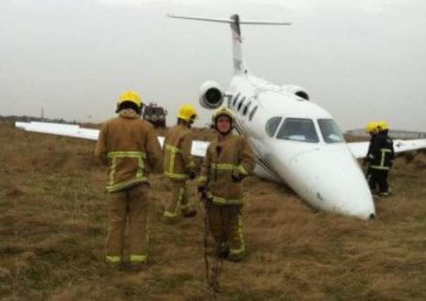 The plane embedded in the grass after overshooting the runway at Blackpool Airport