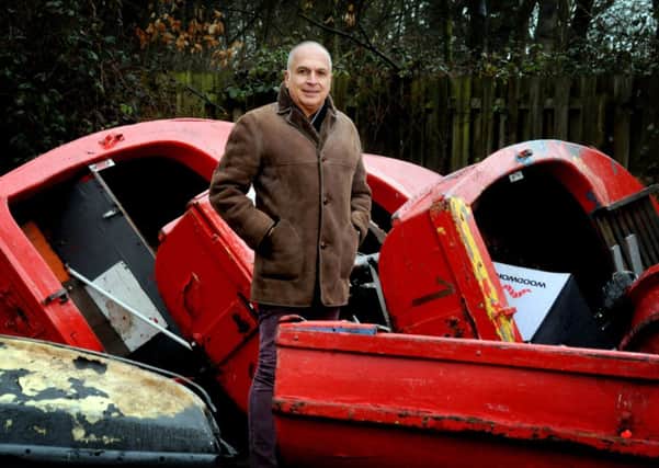 Director of Blackpool Parks Limited Hagop Tchobanian with the old Stanley Park lake boats he is offering for community use
