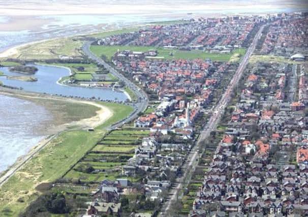 AERIAL VIEW / FAIRHAVEN LAKE / WHITE CHURCH / GRANNY'S BAY / CLIFTON DRIVE RUNS TOP RIGHT  TO BOTTOM looking north from Lytham, where West Beach becomes Clifton Drive heading towards St Annes.